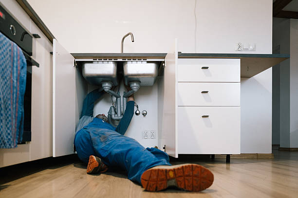Professional Emergency Plumber technician working in Cable, OH